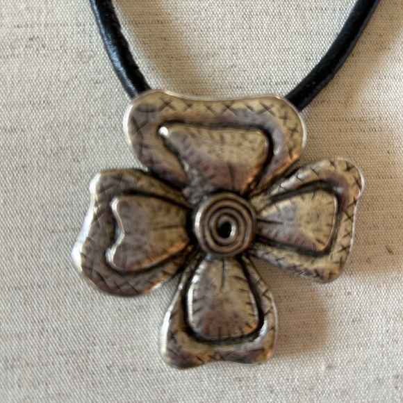 Silver tone metal flower on leather cord necklace, 18” - Picture 2 of 2